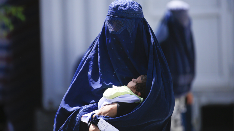 Afghan woman with child