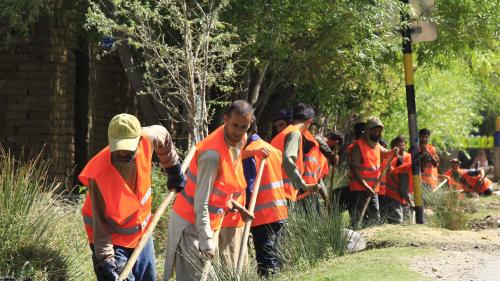   Men cleaning water supply canal in Kapisa Province.