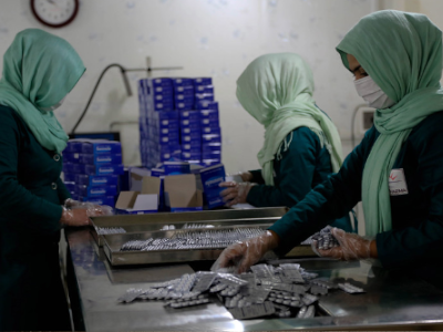Afgan women working at a pharma plant