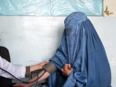 Afghan woman with a doctor